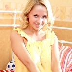 Pic of Blonde Mandy Dee shows off her amazing big boobies before fisting her shaved pussy