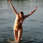 Pic of Naked babe drying herself off