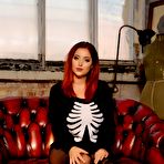 Pic of Redhead girl Lucy Vixen is wearing sexy lace pantyhose and no bra on the big globes