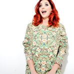 Pic of Posing erotically this little slut Lucy Vixen stays with the big melons all naked