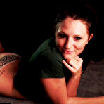 Pic of Stunning softcore honey Freckles takes her shorts off to pose butt naked on her couch.