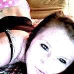 Pic of Being a super hot tease brunette Freckles is wearing pink clothes and sucking on a sex toy