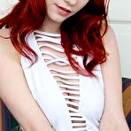 Pic of Red-haired babe Piper Fawn poses naked in white socks after she removes her panties