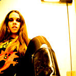 Pic of Alternative girl Athena Hollow dressed in black shows off her nice ass and flashes her tiny tits