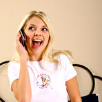 Pic of Tight blonde Jana Jordan shows off her tiny ass on the bed and plays with red dildo