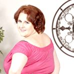 Pic of Redhead fattie Sapphire 38L takes off her pink dress and black lingerie to take black cock