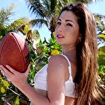 Pic of Rugby-loving brunette takes off her tiny shorts and poses naked on the floo - IamXXX.com