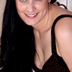 Pic of Dark-haired seductress showing off her amazing pussy up close - IamXXX.com