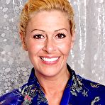 Pic of Bleached MILF with perfectly round breasts masturbating on camera - IamXXX.com