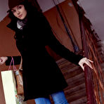 Pic of Ponytailed brunette in a bodysuit hiding her pussy with a fedora - aMetart.com