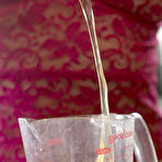 Pic of Stunning brunette breaks some eggs to make an omelet, gets naked - aMetart.com