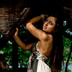 Pic of Dark-haired chick with long slender legs ends up completely naked - aMetart.com