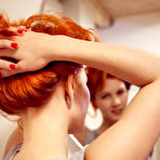 Pic of Short-haired redhead takes off her cyan-colored lingerie on cam - aMetart.com