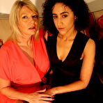 Pic of Horny British housewife playing with a lesbian teeny babe