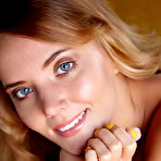 Pic of Mango A Naked in a Green Chair