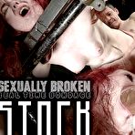 Pic of SexPreviews - Penny Lay redhead is bound in wooden stock and fucked by maledom Jesse Dean