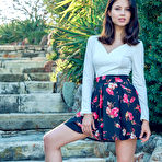 Pic of Flowery skirt brunette shows her red panties and her soft pussy - aMetart.com