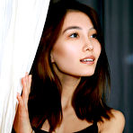 Pic of Flat-chested Asian brunette takes off her black dress to show her pussy - aMetart.com