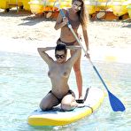 Pic of Busty Katie Salmon topless paddleboarding in Ibiza