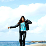 Pic of Pink get-up brunette lifts up her skirt and shows her naked body - aMetart.com