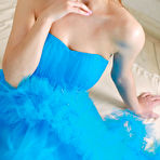 Pic of Blue-eyed and brown-haired hottie teasing her slit on a big bed - aMetart.com