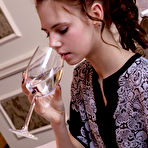 Pic of Wine-drinking redhead in black panties decides to show her smooth slit - aMetart.com