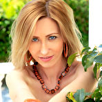 Pic of Blue-eyed blond-haired seductress posing in a luxurious mansion - aMetart.com