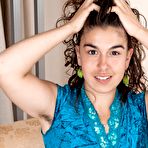 Pic of Lisandra strips naked on her armchair - PussyFur.com