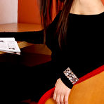 Pic of Dark-haired and exotic brunette fingering her juicy pussy on cam - IamXXX.com