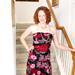 Pic of [All Over 30] Redheaded Roxanne Clemments posing naked on stairs - IWantMature.com
