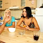 Pic of Lara Amour and Sunny Skies take a shower together then share one cock in the kitchen