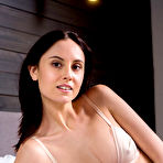 Pic of Free Sade Mare strips on the bed baring her slender body and tight ass.