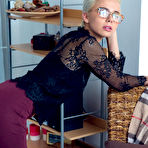 Pic of Short haired teen Lilly Thomson hike up her skirt and bends over at pussyxxxporn.com