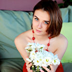 Pic of Free Alice Shea plays with her nipples as she bares her sweet pussy on the couch.