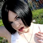 Pic of Tatiana Kush in tight leather skirt blows many black cock with cum shooting all over her face