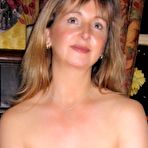 Pic of Mature woman with tight shaved pussy at HomeMoviesTube.com