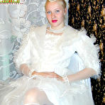 Pic of Absolutely vicious bride lifts her wedding-dress and stuffs her horny slit with a toy pics