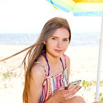 Pic of Check out this cute shapely model that enjoys getting off her swim suit and show off at the local sea shore. pics