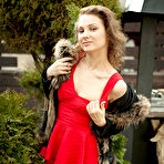 Pic of Nude Sanna displays her unshaven pussy as sheposes on the sofa.
