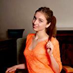 Pic of Nude Viviann spreads her long legs as she bares her smooth pussy.