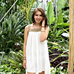Pic of Nude Newcomer Zhenya Mille strips in the garden baring her nubile body.