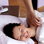 Pic of Nude Iva sensually poses on the bed as she bares her petite body.