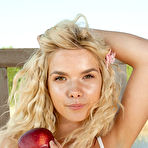 Pic of Absolutely stunning and gorgeous blonde teen plays with fruits and strips naked while posing on the terrace. gallery
