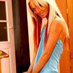 Pic of Astounding cheeky kitten takes off her blue dress to show her appetizing tits and unbelievably sexy piercing on her pussy. gallery