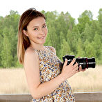 Pic of Nude Newcomer Dominika Jule strips by the lake baring her creamy body and pink cherry.