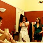 Pic of Absolutely naked guy is getting his dick worshipped by clothed Amanda Pickering and her friend
