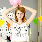 Pic of This astonishing redhead girl really loves playing with herself after getting fully naked on her bed. gallery