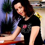 Pic of Hottest A naked teenage schoolgirl fondling herself at her desk by ShavedTeenGirls.com