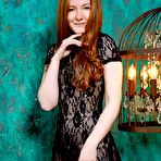 Pic of Anica in a Big Leather Armchair