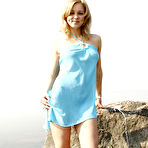 Pic of Lovely teen sweetheart with sexy tight body stripping and posing on the rocks free pictures